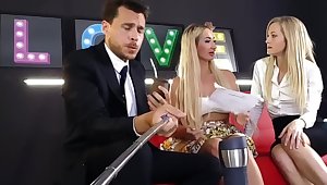 Blonde uses selfie stick during threesome on the red couch